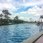 Bright And Stylish 1Br The Oasis Apartment Cikarang By Travelio